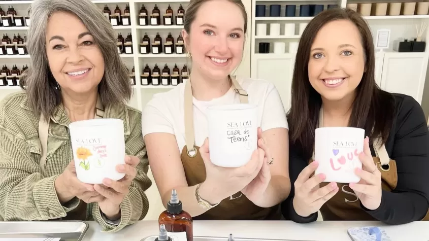3 women with their custom made candles