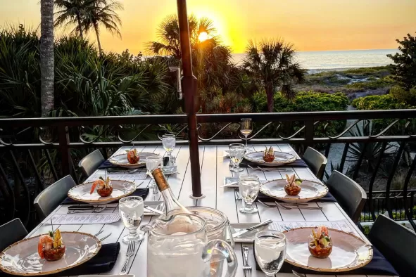 dinner plates with a sunset view