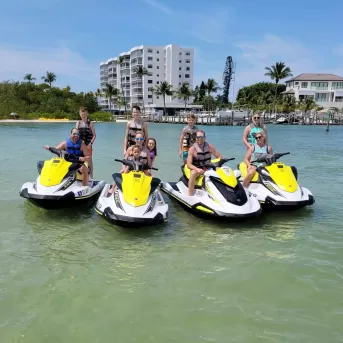 A rider speeds across the water on a jet ski in Fort Myers Beach.